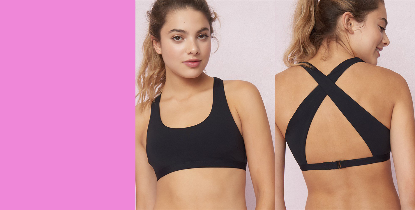 DYNAMITE Super simple front, but holy look at that back! This one is a great secondary bikini top to help vary your back and neck lines to avoid tan lines. AND it's adjustable too! Get this top in black, pink or floral at GARAGE for 26.95CAD